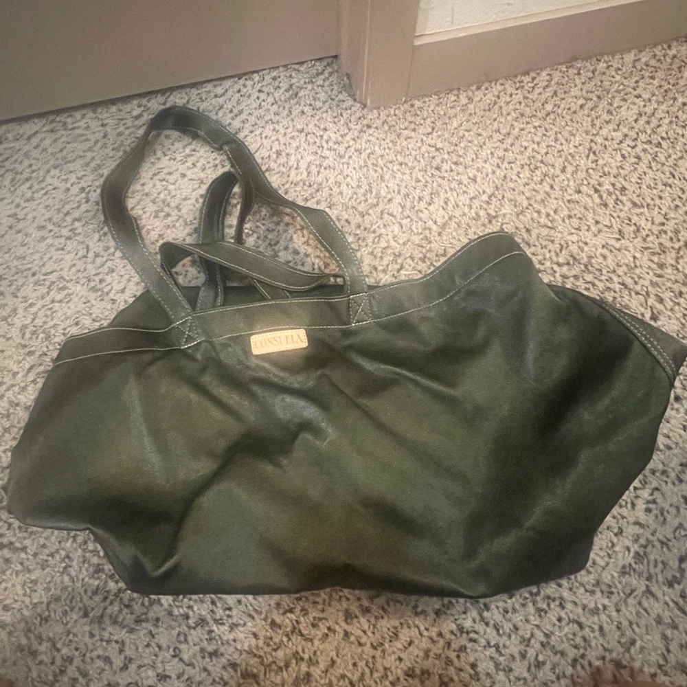 Consuela Green Tote Bag with Adjustable Straps and Weatherproof Design